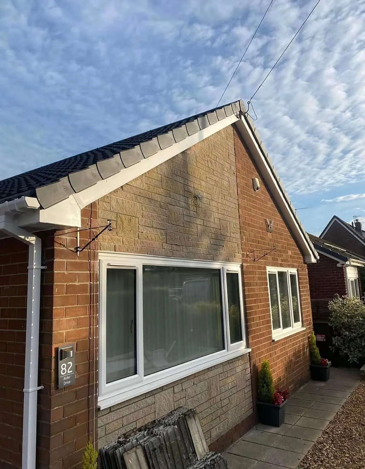Bungalow gable end with new fascia, bargeboards and downpipe